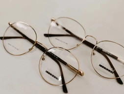 Okulary w złotej oprawie MIEN Eyewear
